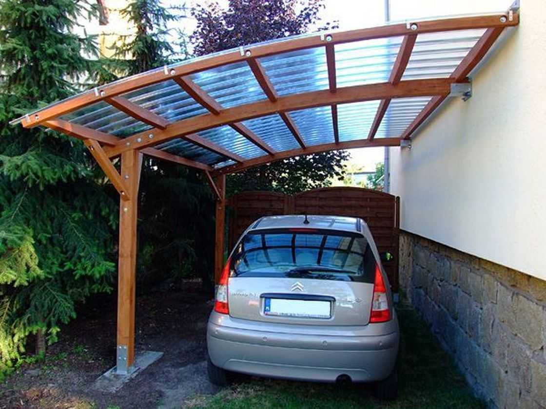 Навес из дерева для автомобиля на даче фото