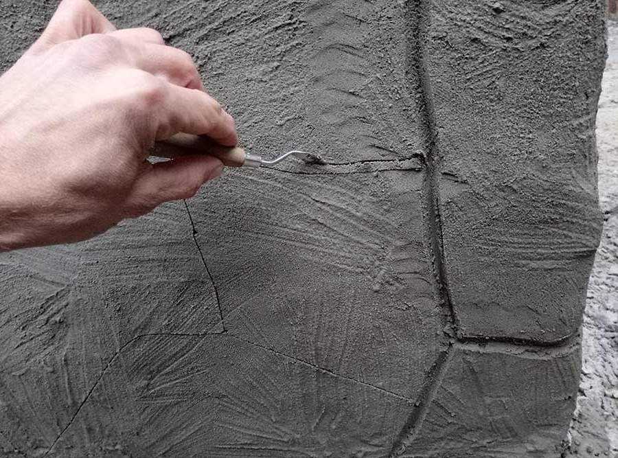Фасадная декоративная штукатурка под камень: виды, способы, техники нанесения