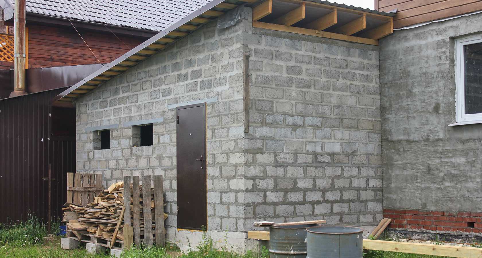 Строим гараж из шлакоблока своими руками: расчет блоков и этапы строительства